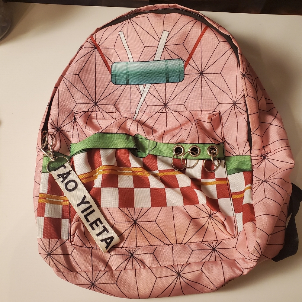 Nezuko Pink Geometric Backpack with Green Accents